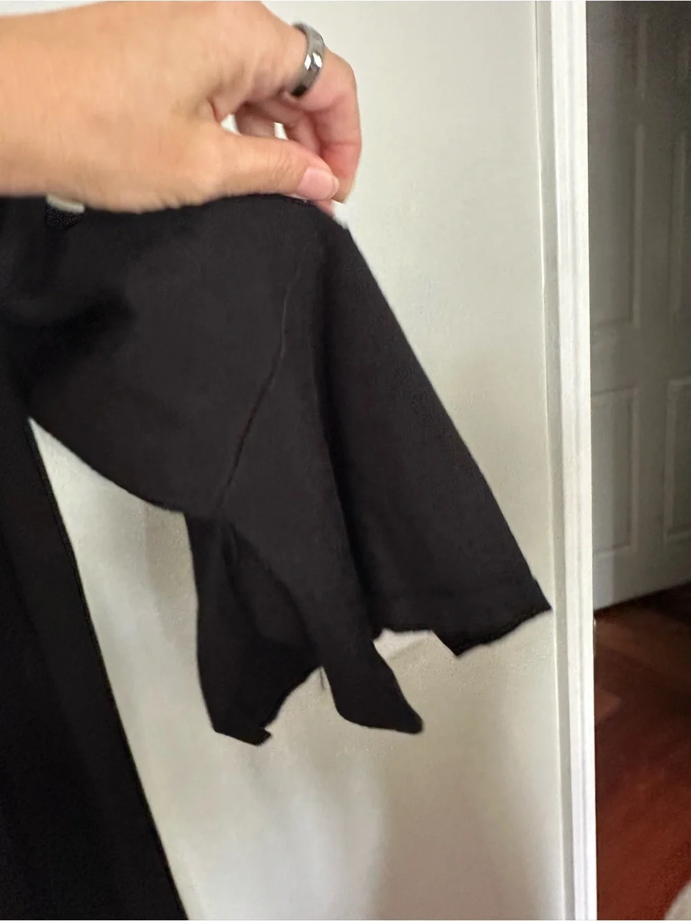 Chico's Black Open-Front tunic length Cardigan with tulip sleeves.